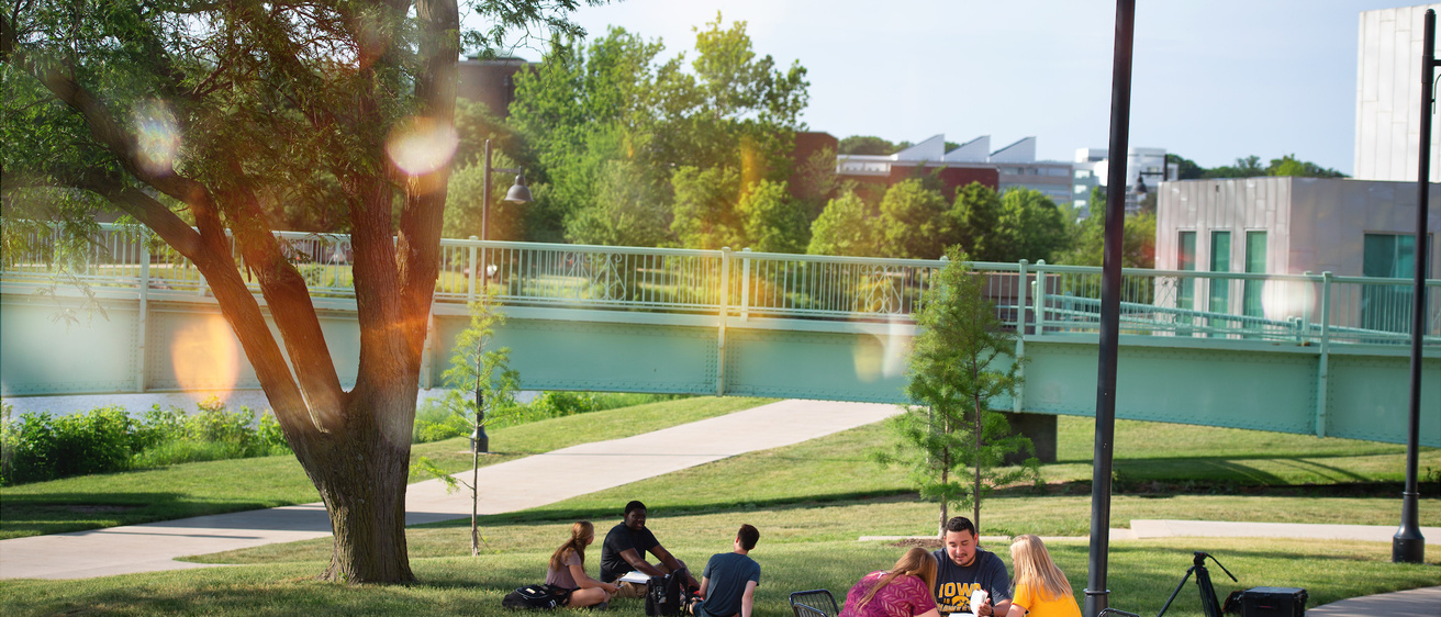 Students studying outdoors at Iowa Memorial Union